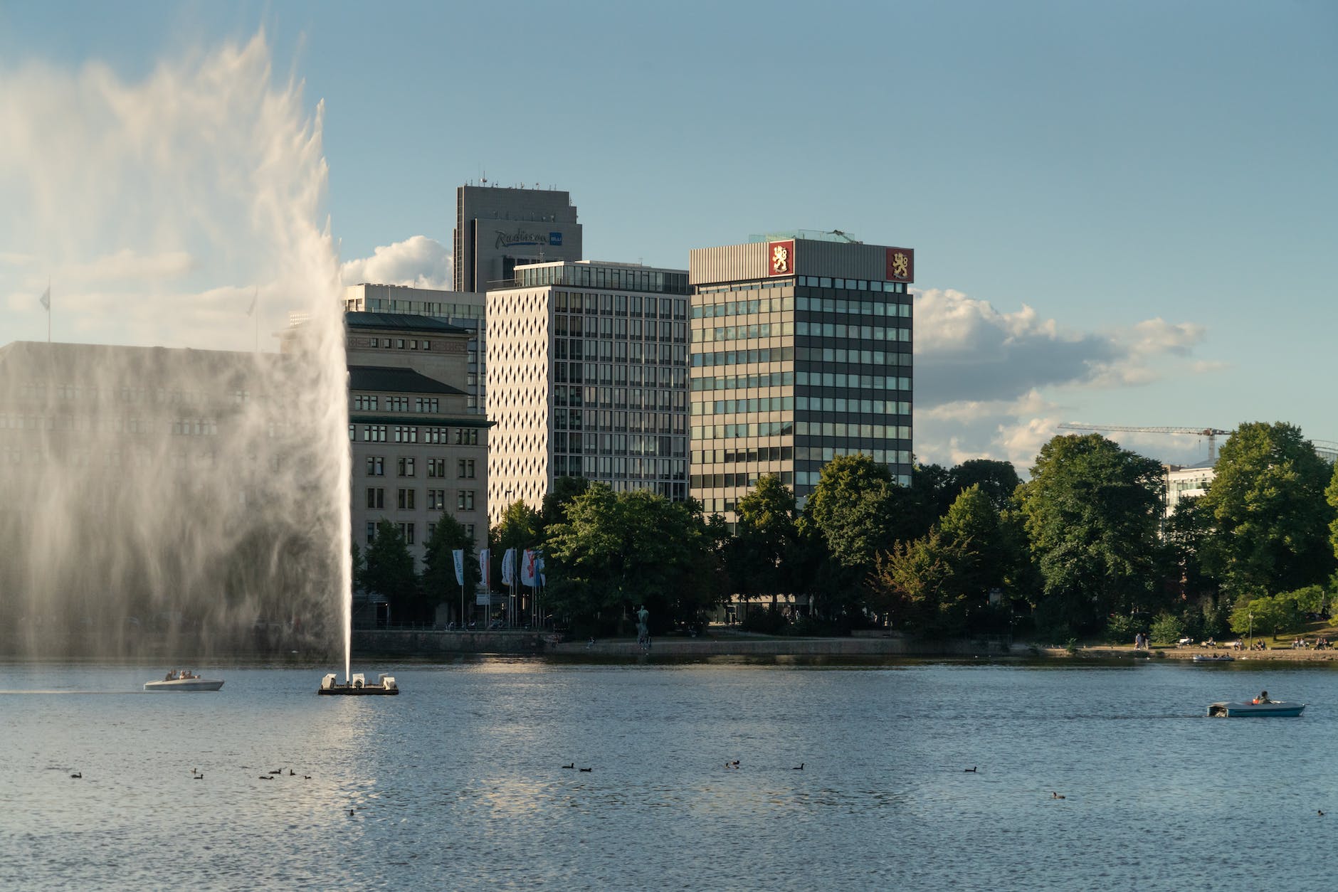 calm river in city with fountain